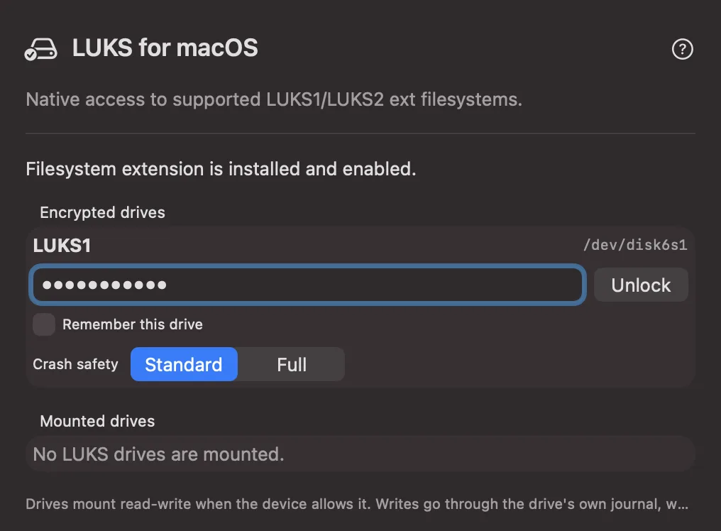 The LuksMac window with a LUKS1 drive selected, a passphrase field, a Remember this drive checkbox, and a Standard / Full crash-safety choice.